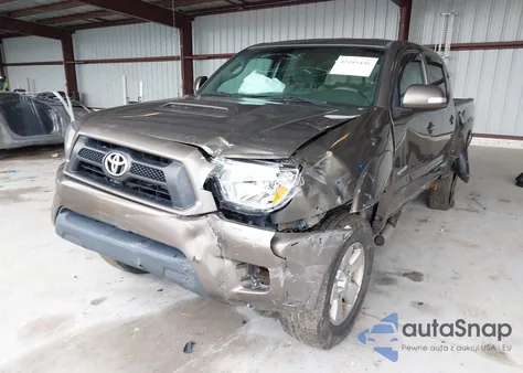 2013 Toyota Tacoma Base V6 z USA, uszkodzony, nr VIN 3TMLU4EN4DM118438